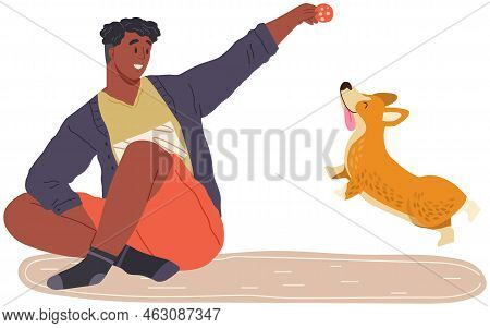 Male Pet Owner With Dog Training, Playing With Ball. Caring For Four-footed Friend Concept. Happy Gu
