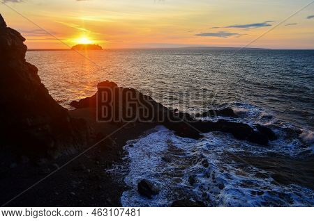 Sunrise Over The Bay Of Fundy From The Fundy Footpath, New Brunswick, Canada With An Island In The B