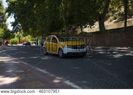 Beni Mellal, Morocco - October 8, 2022: Moroccan Cab Driver Driving Around The City Of Beni Mellal I