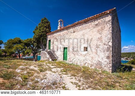 Old Stone Chapel On The Hill Above Town Of Tisno, Murter Island Of Croatia