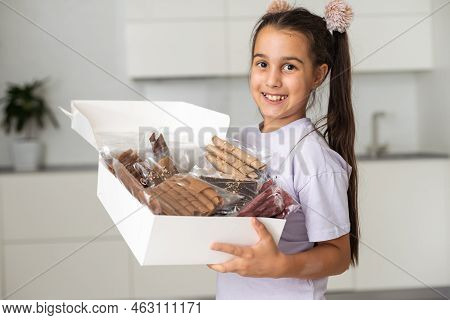 Little Girl With A Box Of Pastilles