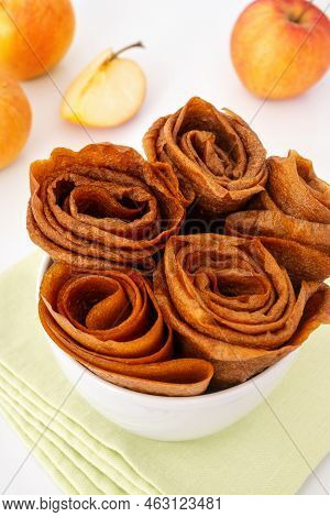 Homemade Apple Pastila Rolled-up, Top View. Dried Mashed Apples For Healthy Diet. Natural Fruit Dess