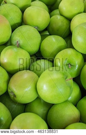 Green Apple Texture, Lots Of Green Apples. Apples Storage. Bunch Of Green Delicious Apples In A Box 