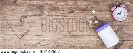 Women Health, Middle Age And Menopause Concept. Health Care Style. Copy Space.white Plastic Bottle W