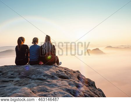 Kleiner Winterberg, Germany. June 27 2021. Girl Friends Sitting Together On Cliff. Amazing Misty Mor
