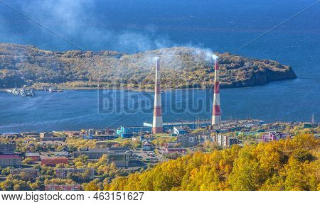 Two Striped Pipes Smoke Of A Power Plant On Kamchatka Peninsula