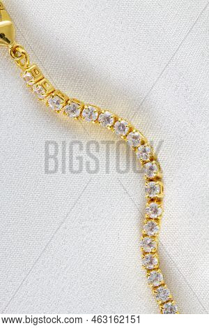 Bracelet Chain With Zircons Close-up On White Background Background