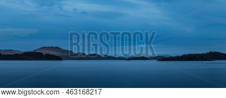 Stunning Landscape Image Of Loch Lomond And Snowcapped Mountain Range In Distance Viewed From Small 