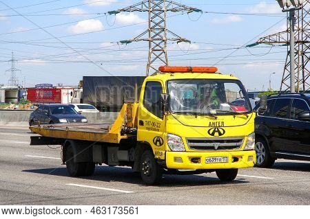 Moscow, Russia - June 2, 2012: Bright Yellow Tow Truck Foton Auman At An Interurban Road.