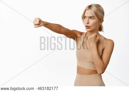 Portrait Of Girl Athlete, Sportswoman With Fit Fitness Body, Boxing, Restle With Raised Fists, Learn