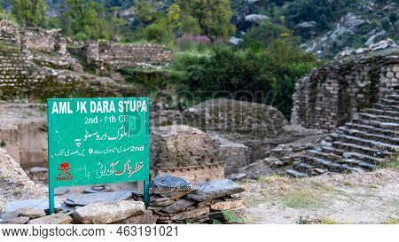 Amluk Dara Stupa In The Swat Valley With A Sign Board In English And Urdu Translation. It Is Believe
