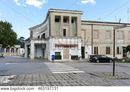 Tresigallo,italy-may 2, 2021:strolling In  The Metaphysical City Of Tresigallo During A Cloudy Day
