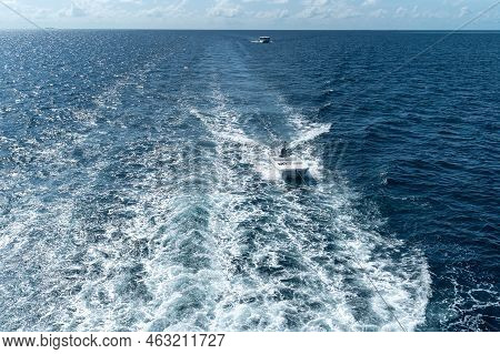 View From The Boat Stern Of The Wake (wash) Effect On The Water From The Motor Placed On The Transom