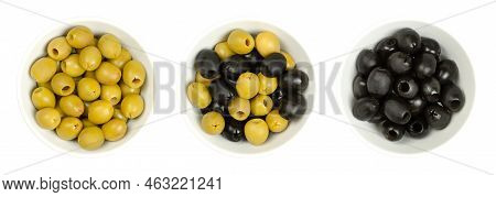 Pitted Green And Black Olives, Hojiblanca, In White Bowls, From Above. European Olives, Olea Europae