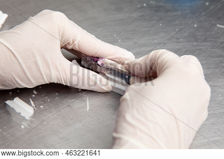 Scientist Preparing Paraffin Blocks Containing Biopsy Tissue For Sectioning. Pathology Laboratory. C