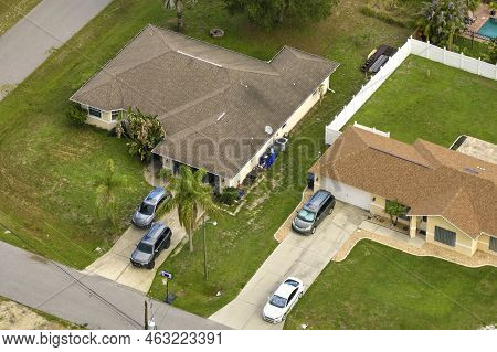 Aerial View Of Typical Contemporary American Private House With Roof Top Covered With Asphalt Shingl