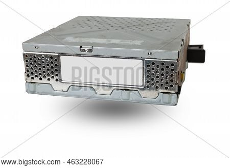 Metallic Car Engine Control Unit With Plastic Elements Soaring On A White Isolated Background Is Con