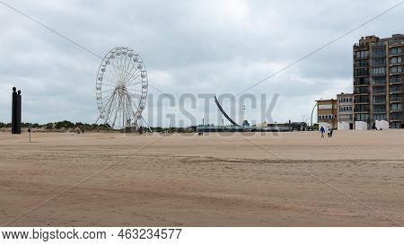 De Panne, West Flanders Region - Belgium - 07 16 2021 Ferris Wheel At  The Beach