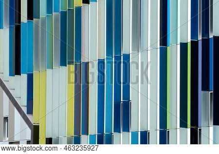 Dilbeek, Flemish Brabant Region, Belgium - 7 2 2021 Abstract Colors And Lines From The Facade Of A C