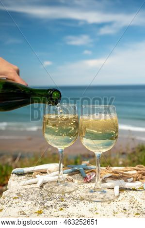 Tasting Of Txakoli Or Chacolí Slightly Sparkling Very Dry White Wine Produced In The Spanish Basque
