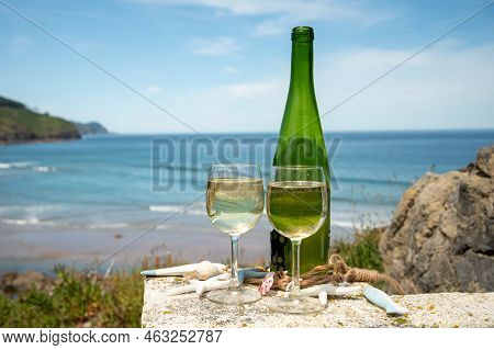 Tasting Of Txakoli Or Chacolí Slightly Sparkling Very Dry White Wine Produced In The Spanish Basque