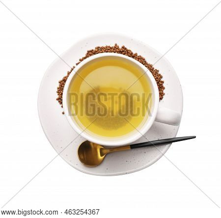 Cup Of Aromatic Buckwheat Tea And Granules On White Background, Top View
