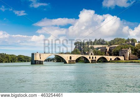 Saint Benezet Bridge And Palace Of The Popes In Avignon In A Beautiful Summer Day, France