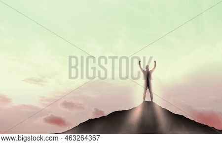 Silhouette Man Standing Against Sunset Or Surise Sky. Success, Achievement And Goal Concept. Competi