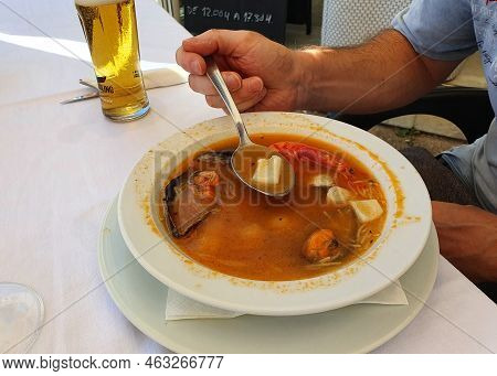 Delicious Healthy Traditional Fish Soup With Seafood In A Restaurant In Spain