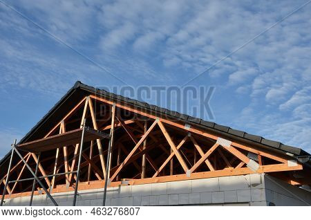 The Trusses Are Made From High-quality, Strength-graded Lumber And Connected By Steel Buttplates Wit