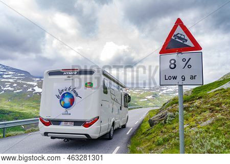 Skjolden, Norway - July 4, 2022: Motorhome Passing A Steep Hill Warning Sign At The Oscarshaug Viewp