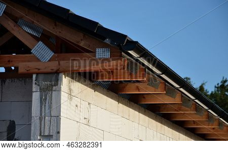 The Trusses Are Made From High-quality, Strength-graded Lumber And Connected By Steel Buttplates Wit