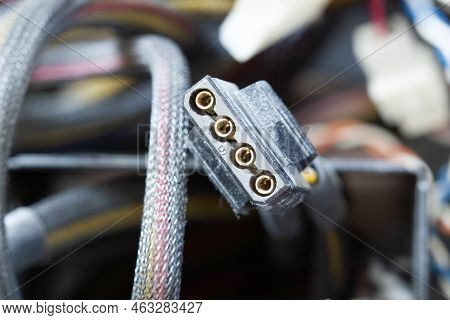 Very Dirty Wires, Connectors And Plugs In The Computer. Old Multi-colored Wires In A Braided Wrapper