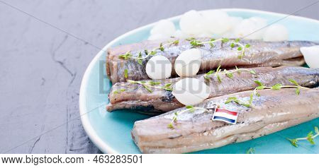 Freshly Salted Herring With Salt, With Copy Space. Traditional Dutch Delicacy