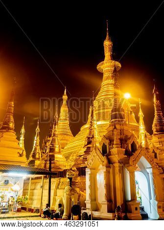 The Golden Pagodas And Mondops Are Illuminated In The Light Of The Night
