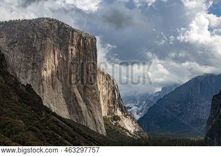 The Famous El Capitan Peak Is Scene From Near The Tunnel View Overlook With Clouds And Afternood Lig
