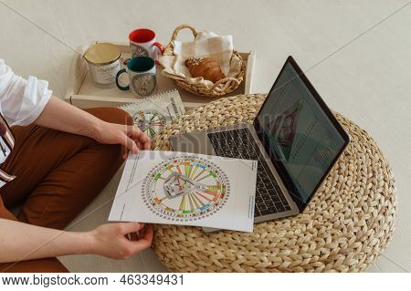 Tver, Russia-august 7, 2022. A Woman With A Laptop Is Studying Human Design. The Concept Of Studying