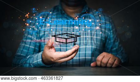 Man Holding Icon Graduate Hat And Icons Of E-learning. E-learning, Online Education Concept. E-learn