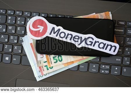 Ternopil, Ukraine - September 6, 2022 Moneygram Paper Logotype Lies On Black Laptop Keyboard With Eu