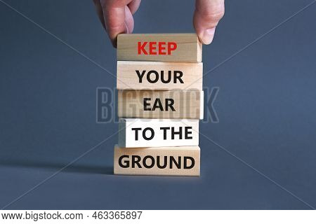 Keep Your Ear To The Ground Symbol. Concept Words Keep Your Ear On The Ground On Wooden Blocks. Busi