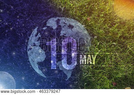 May 10th. Day 10 Of Month, Calendar Date. Day To Night Background Concept. Scene With Globe The Gree