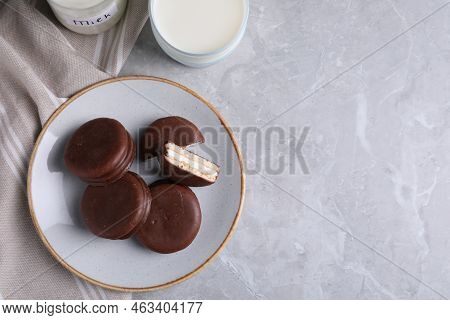 Tasty Choco Pies And Milk On Light Grey Marble Table, Flat Lay. Space For Text