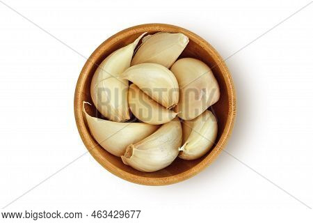 Fresh Garlic Cloves In Wooden Bowl On White Background