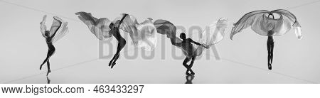 Monochrome. Young Beautiful Female Ballet Dancer In Different Images Dancing With Silk Fabric Isolat