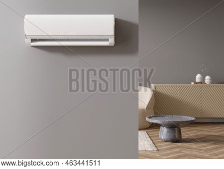 Modern Air Conditioner Hanging On The Wall In Room. Cooling Product For Hot Climate In Summer. Machi