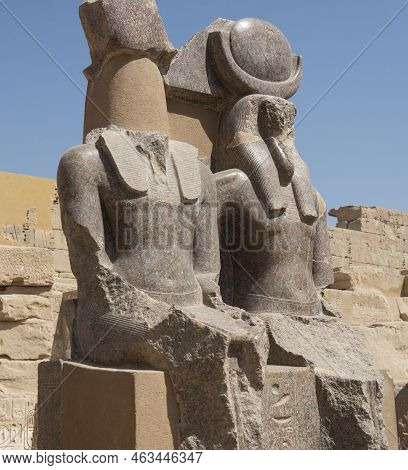 Pair Of Large Seated Statues In Ancient Egyptian Mediant Habu Temple At Luxor