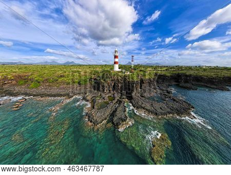 Lighthouse On The Cliff Over The Sea. Mauritius Island