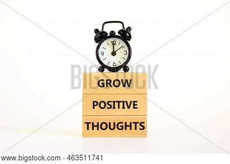 Grow Positive Thoughts Symbol. Concept Words Grow Positive Thoughts On Blocks. Beautiful White Backg