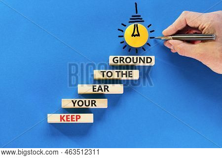 Keep Your Ear To The Ground Symbol. Concept Words Keep Your Ear On The Ground On Wooden Blocks. Busi