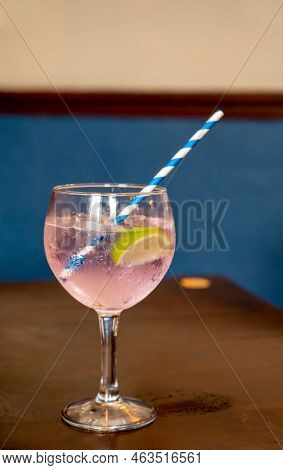Glass Of Gin And Tonic Cocktail Served In Old Vintage Scottisch Pub, Drinking Gin In Edinburgh, Uk
